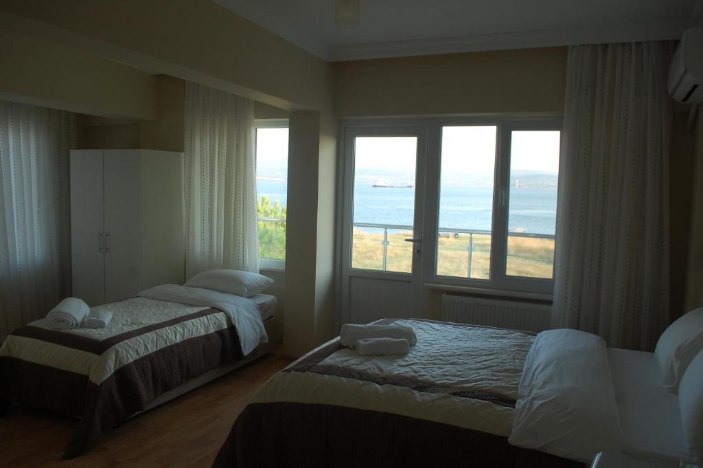 Flora Hotel Burhanli Zimmer foto